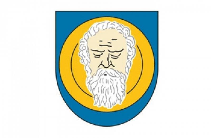 Na zdjęciu herb Zdun